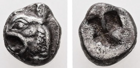 Ionia, Phokaia. AR Obol. 0.77 g. - 7.83 mm. ca. 521-478 BC.
Obv.: Head of griffin left.
Rev.: Rough incuse square.
Ref.: SNG Von Aulock 2118.
Fine / V...
