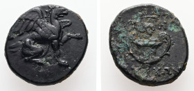 Ionia, Teos. AE. 4.96 g. - 18.81 mm. ca. 4th-3rd century BC. Lykon, magistrate.
Obv.: Griffin seated right, with left forepaw raised.
Rev.: THI / ΛY-K...