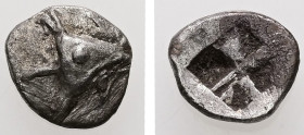 Mysia, Kyzikos. AR Hemiobol. 0.48 g. - 8.89 mm. c. 600-550 BC.
Obv.: Tunny fish head to right with small tunny or lotus flower in mouth.
Rev.: Quadrip...