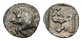Mysia, Kyzikos. AR, Hemiobol. 0.34 g. - 8.96 mm. Circa 450-400 BC.
Obv.: Forepart of boar left; to right, tunny upward.
Rev.: Head of roaring lion lef...