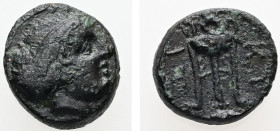 Mysia, Kyzikos. AE. 1.29 g. - 10.27 mm. ca. 3rd century BC. 
Obv.: Head of Kore Soteira right, hair bound in sakkos.
Rev.: K-Y / Z-I. Tripod; below, t...