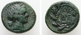 Mysia, Kyzikos. AE. 6.95 g. - 18.14 mm. Circa 2nd-1st centuries BC.
Obv.: Head of Kore Soteira right with hair gathered at nape and grain wreath; with...