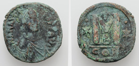Anastasius, AD 491-518. AE, Follis. 16.05 g. 31.22 mm. Constantinople.
Rev: DNANASTA-[SIVSP]PAVC. Bust of Anastasius I facing right with diadem, cuira...