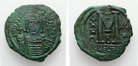 Justinian I. AD.527-565. AE, Follis. 23.01 g. - 39.81 mm. Theoupolis (Antiochia) mint, 2nd officina. Dated RY 16 (AD. 542/3).
Obv.: D N IVSTINIANVS P...