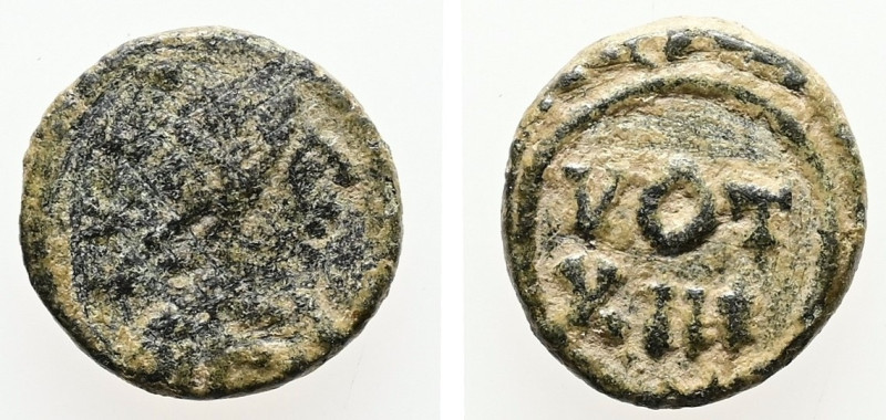 Justinian, AD 527-565. AE, Nummus. 0.64 g. 9.79 mm. Carthage.
Obv: Diademed, dra...