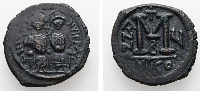 Justin II and Sophia, AD 565-578. AE, Follis. 12.75 g. 31.76 mm. Nicomedia.
Obv:...