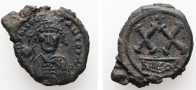 Tiberius II Constantine, AD 578-582. AE, Half Follis. 7.30 g. 28.72 mm. Nicomedia.
Obv: D m TIB CONSTANT P P AV. Frontal bust of Tiberius II Constanti...