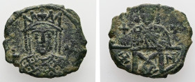 Constantine VI and Irene, AD 780-797. AE, Follis. 2.96 g. 19.67 mm. Constantinople.
Obv: Crowned bust of Irene wearing loros, holding cross on globe a...