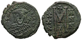 Michael I Rhangabe, 811-813 AD. AE, Follis. 5.98 g. 22.95 mm. Constantinople.
Obv: MIXAHL ЬASILЄ. Facing bust of Michael, wearing crown with cross on ...