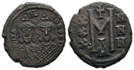 Michael I and Theophilus, AD 811-813. AE, Follis. 6.19 g. 22.31 mm. Constantinople.
Obv: mIXAHL-SΘ-EOFIL. Crowned busts facing of Michael with short b...