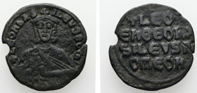 Leo VI the Wise, AD 886-912. AE, Follis. 5.85 g. 25.29 mm. Constantinople.
Obv: + LЄOҺЬAS-ILЄVSROM. Frontal bust of Leo VI with short beard wearing ch...