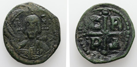Romanus IV Diogenes, AD 1068-1071. AE, Follis. 7.98 g. 29.13 mm. Constantinople.
Obv: IC – XC / NI – KA. Bust of Christ facing, dotted cross behind he...