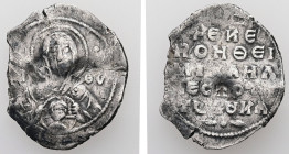 Michael VII Ducas, AD 1071-1078. 2/3 Miliaresion. 1.23 g. 21.52 mm. Constantinople.
Obv: MP - ΘV. Bust of the Virgin orans with medallion of Christ be...