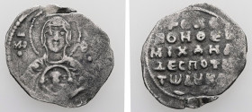 Michael VII Ducas, AD 1071-1078. 2/3 Miliaresion. 1.38 g. 20.48 mm. Constantinople.
Obv: MP - ΘV. Bust of the Virgin orans with medallion of Christ be...