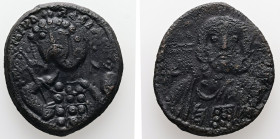 Michael VII Ducas, AD 1071-1078. AE, Follis. 5.41 g. 25.09 mm. Constantinople.
Obv: Frontal bust of Christ bearded, with cross behind head, wearing tu...
