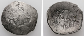Alexius I, AD 1081-1118. Bl, Aspron Trachy. 4.11 g. 28.21 mm. Constantinople.
Obv: [IC-XC] to left and right of Christ, nimbate, seated facing, holdin...