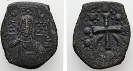 Anonymous Follis. Class J. Alexius I, AD 1081-1118. AE, Follis. 5.97 g. 23.59 mm. Constantinople. 
Obv: Nimbate bust of Christ facing, wearing tunic a...
