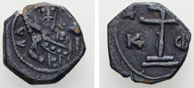 Alexius I Comnenus, AD 1081-1118. AE, Tetarteron. 2.41 g. 15.49 mm. Uncertain mint.
Obv: AΛEZI. Frontal bust of Alexios I Komnenos wearing stemma, div...