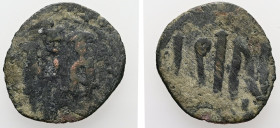 Andronicus II Palaeologus and Michael IX. AD 1282-1328. AE, 1.56 g. 20.02 mm. Constantinople. Dated IY 14 (1300/1). 
Obv: Large NIΩ (date).
Rev: Andro...