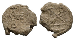 PB Byzantine monogrammatic seal (c. AD 7th century)
Obv: Cruciform invocative monogram of Θεοτόκε βοήθει. Wreath border.
Rev: Cruciform monogram.
Weig...