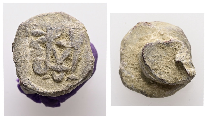 AE Byzantine bronze stamp seal (AD 5th–7th centuries)
On the face, block monogra...