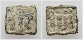 PB Late Roman weight. 3 grammata (AD 4th – 5th centuries)
Square coin or commercial weight of 3 grammata (3 scrupuli).
Obv: Three standing figures.
Re...