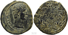 ASIA MINOR. Uncertain. Augustus (27 BC-14 AD). Ae. 

Obv: CAESAR. 
Bare head right.
Rev: AVGVSTVS. 
Legend in one line within laurel wreath.

R...