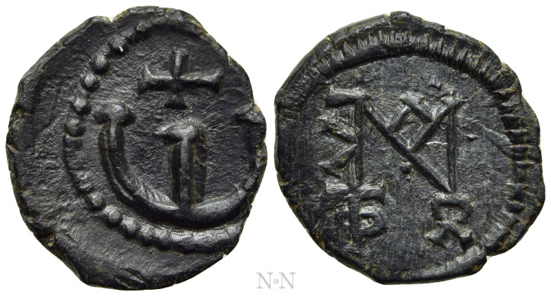 JUSTIN II (565-578). Pentanummium. Theoupolis (Antioch). 

Obv: Monogram.
Rev...