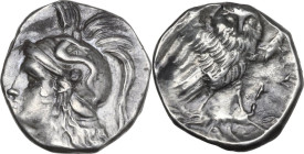 Greek Italy. Southern Apulia, Tarentum. AR Drachm, c. 281-272 BC. Obv. Head of Athena left with hair flowing down behind. Rev. Owl standing on thunder...