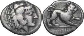 Greek Italy. Southern Lucania, Heraclea. AR Diobol, c. 432-420 BC. Obv. Beardless head of Herakles right, wearing lion skin. Rev. Lion crouching right...