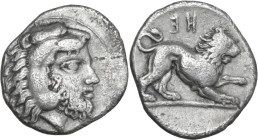 Greek Italy. Southern Lucania, Heraclea. AR Diobol, c. 432-420 BC. Obv. Bearded head of Herakles right, wearing lion skin. Rev. Lion crouching right; ...