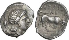 Greek Italy. Southern Lucania, Thurium. AR Diobol, 350-300 BC. Obv. Head of Athena right, wearing helmet decorated with wreath. Rev. ΘOYPIΩN. Bull but...