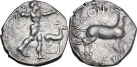 Greek Italy. Bruttium, Kaulonia. AR Stater, c. 475-388 BC. Obv. Apollo, naked, walking right, holding palm branch; before, stag standing right. Rev. S...