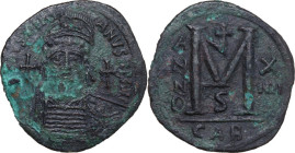 Justinian I (527-565). AE Follis, Carthage mint. Dated RY 14 (540/1 AD). Obv. D N IVSTINIANVS P P AVG. Helmeted and cuirassed bust facing, holding glo...