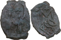 Heraclius (610-641) with Heraclius Constantine. AE Overstruck Follis, Syracuse mint, 630-641. Obv. c/m: Buts of Heraclius (long beard) and Heraclius C...