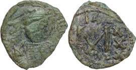 Constantine IV Pogonatus (668-685). AE Follis, Ravenna mint. Obv. Helmeted and cuirassed bust facing slightly right, holding spear over shoulder and s...