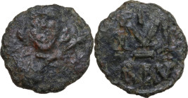 Tiberius III (698-705). AE Follis, Ravenna mint. Obv. Crowned facing half-length bust, holding spear and shield. Rev. Large M; cross above; in exergue...