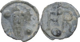 Leads from Ancient and Medieval World. PB Tessera. Medieval period, c. 10th-12th centuries AD. D/ Crowned (?) and bearded facing bust, flanked by two ...