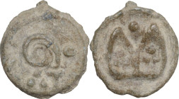 Leads from Ancient and Medieval World. PB Tessera. Medieval period, c. 10th-12th centuries AD. D/ Spiral or lituus. R/ Two arches (?). PB. 2.90 g. 17....
