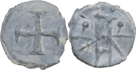 Leads from Ancient and Medieval World. PB Tessera. Medieval period, c. 10th-12th centuries AD. D/ Cross. R/ Uncertain symbol. PB. 1.57 g. 14.50 mm. Go...