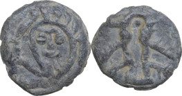 Leads from Ancient and Medieval World. PB Tessera. Medieval period, c. 10th-12th centuries AD. D/ Stylized portrait with arch (?). R/ Bird. PB. 3.40 g...