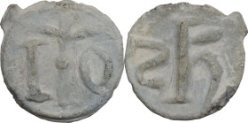 Leads from Ancient and Medieval World. PB Tessera. Medieval period, c. 10th-12th centuries AD. D/ IO or 10, long cross in the middle. R/ Letters. PB. ...