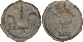 Leads from Ancient and Medieval World. PB Tessera. Medieval period, c. 10th-12th centuries AD. D/ Lily. R/ Turret. PB. 2.49 g. 16.00 mm. VF.