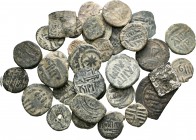 Lote de 34 monedas de Al Andalus, 28 feluses y 6 dirhems, 2 de ellos almohades. A EXAMINAR. BC/MBC. Est...150,00.