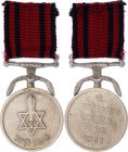Nepal Royal Guards Service Medal 1977 vsAE 38 mm.; On double kukri and ribbon bar suspension; the face with a double-triangle six-pointed star, an upr...