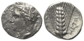 Lukanien. Metapont.

 Nomos (Silber). Ca. 330 - 290 v. Chr.
Vs: Kopf der Demeter mit Ährenkranz links.
Rs: Getreideähre; im Feld rechts Ethnikon. ...