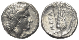 Lukanien. Metapont.

 Nomos (Silber). Ca. 330 - 290 v. Chr.
Vs: Kopf der Demeter rechts.
Rs: Getreideähre; im Feld links Ethnikon, darunter Lambda...
