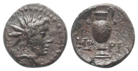 Aiolis. Myrina.

 Bronze. 2. - 1. Jhdt. v. Chr.
Vs: Kopf des Helios rechts.
Rs: Amphora.

12 mm. 1,69 g. 

SNG München 574; SNG Copenhagen 226...