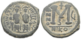 Iustinus II. (565 - 578 n. Chr.).

 Follis (40 Nummi, Bronze). 569 / 570 n. Chr. (Jahr 5). Nikomedia.
Vs: Iustinus mit Kreuzglobus und Sophia mit K...