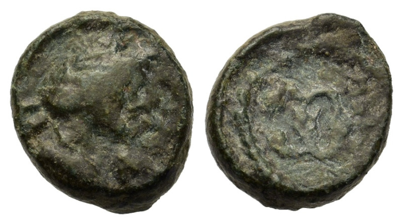 Gaul, Massalia, after 49 BC. Æ (5,4mm, 2g). Laureate head of Apollo r. R/ Winged...